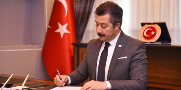 ERCAN ÖZEL