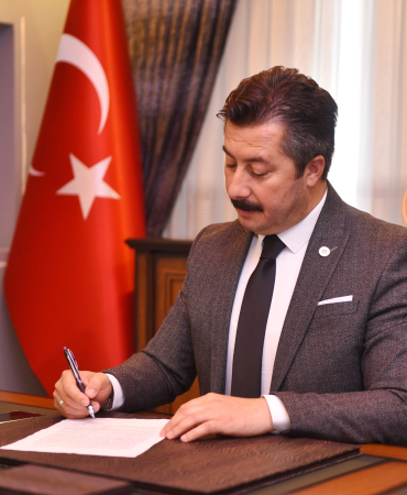ERCAN ÖZEL